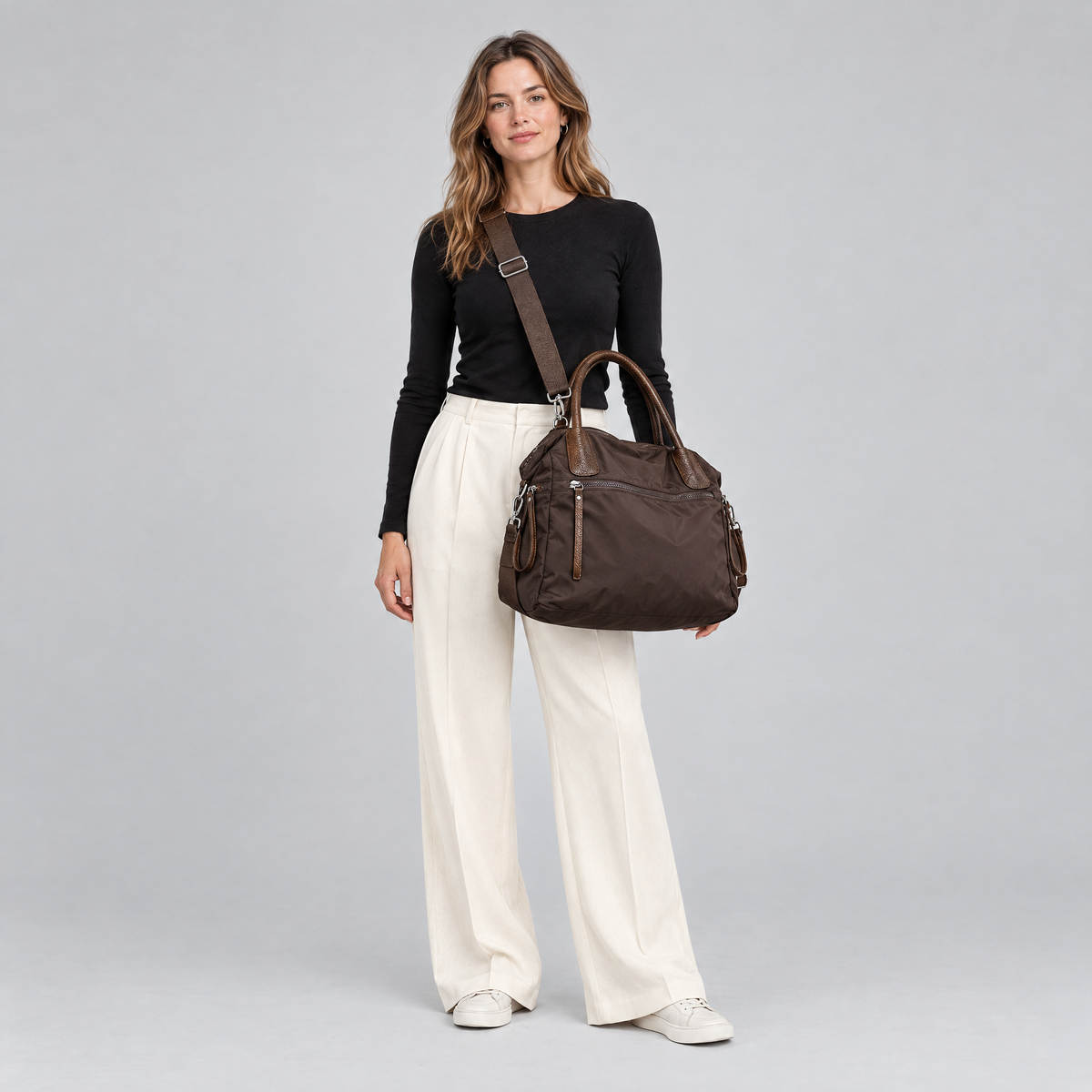 The Weekday Tote in chocolate brown worn crossbody